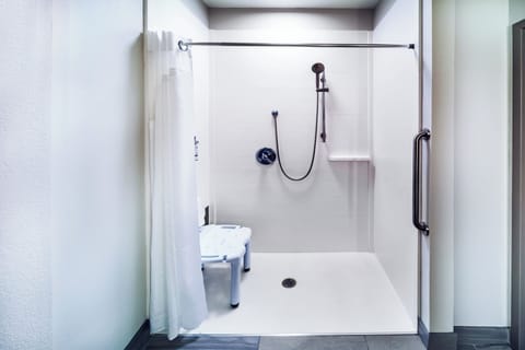 Down comforters, desk, blackout drapes, iron/ironing board