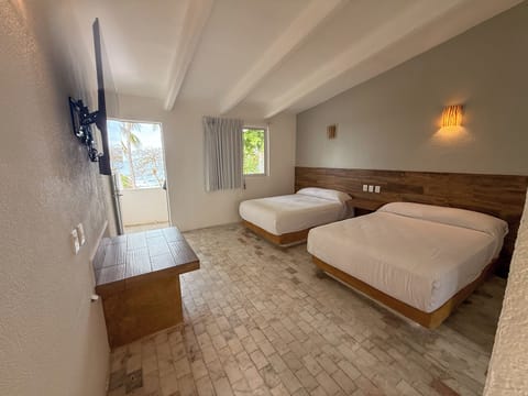 Standard Room, 2 Double Beds, Partial Ocean View | Premium bedding, bed sheets