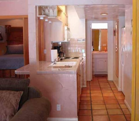 Grand Suite, 1 King, 1 Queen Murphy, Full Kitchen, Fireplace | Private kitchen | Fridge, microwave, coffee/tea maker, toaster