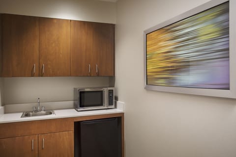 Desk, blackout drapes, iron/ironing board, free cribs/infant beds