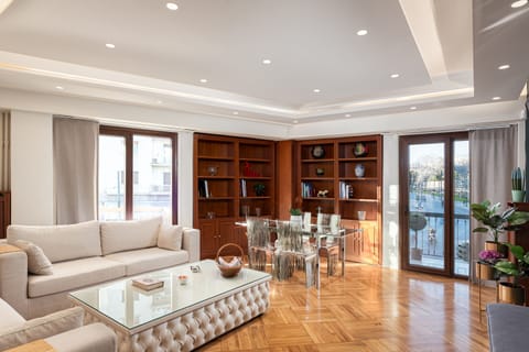 City Apartment | Living area | 50-inch Smart TV with cable channels, TV, Netflix