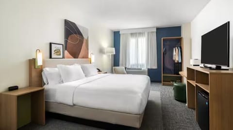 Premium bedding, memory foam beds, desk, laptop workspace