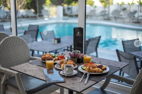 Daily buffet breakfast (EUR 11 per person)