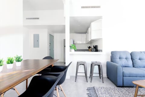 Superior Apartment | Living area | 55-inch Smart TV with digital channels, TV