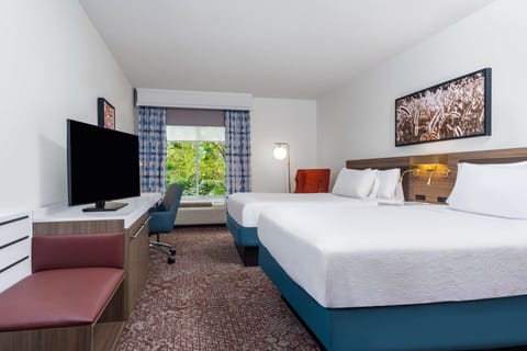 Desk, blackout drapes, iron/ironing board, free cribs/infant beds