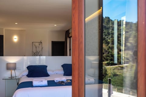 Premium bedding, down comforters, laptop workspace, soundproofing