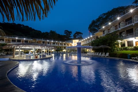 Outdoor pool, open 8:00 AM to 8:00 PM, pool umbrellas, sun loungers
