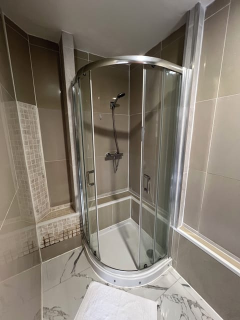 Shower, free toiletries, towels, soap