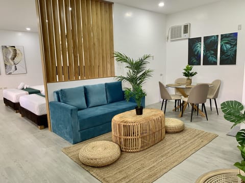 Executive Single Room, Multiple Beds, Non Smoking, Garden View | Living area | 55-inch Smart TV with digital channels, TV