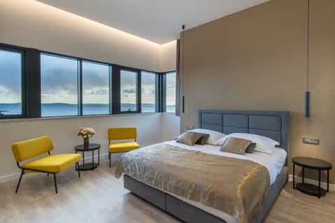 Premium bedding, memory foam beds, minibar, desk