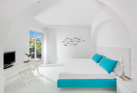 Standard Double Room, Sea View | Frette Italian sheets, in-room safe, desk, blackout drapes