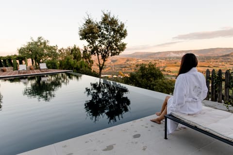 Outdoor pool, open 8:00 AM to 10:00 PM, pool umbrellas, sun loungers