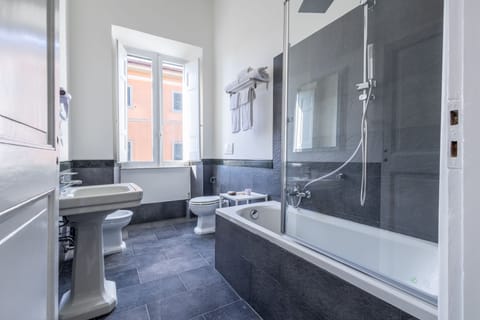 Room | Bathroom | Rainfall showerhead, free toiletries, bathrobes, towels