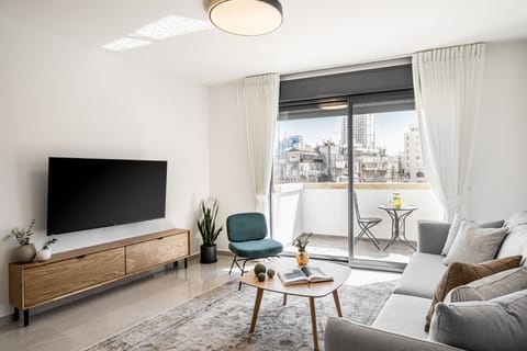 2BR Apartment (Agripas #6-8 St.) | Living area | 55-inch LCD TV with digital channels, TV, Netflix