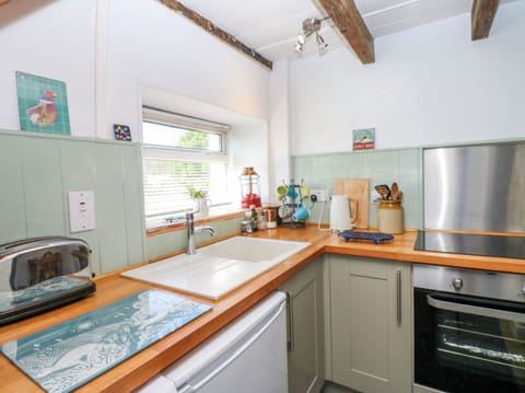 Fridge, electric kettle, toaster, cookware/dishes/utensils