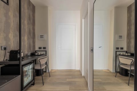 Premium bedding, down comforters, pillowtop beds, free minibar