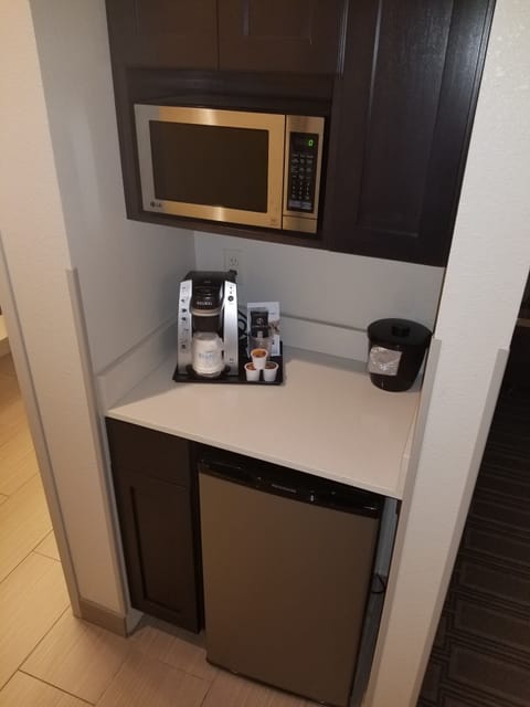 Desk, laptop workspace, blackout drapes, iron/ironing board