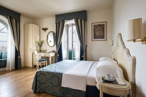 Minibar, in-room safe, desk, laptop workspace