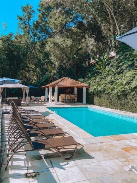 Outdoor pool, open 11:00 AM to 8 PM, pool umbrellas, sun loungers