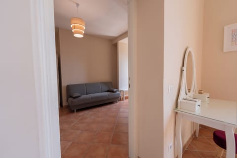 Deluxe Suite | Living area | Flat-screen TV