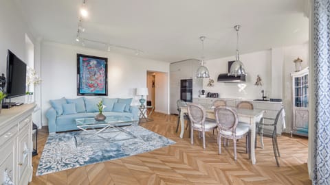 Apartment (ul. Wiejska 58/4) | Living area | Flat-screen TV