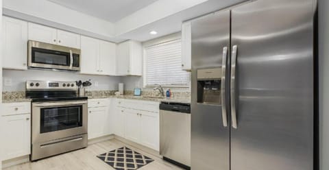 Condo, 2 Bedrooms, Patio | Private kitchen | Fridge, microwave, coffee/tea maker, paper towels