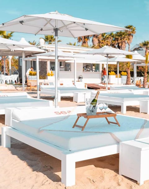 Private beach nearby, white sand, sun loungers, beach umbrellas