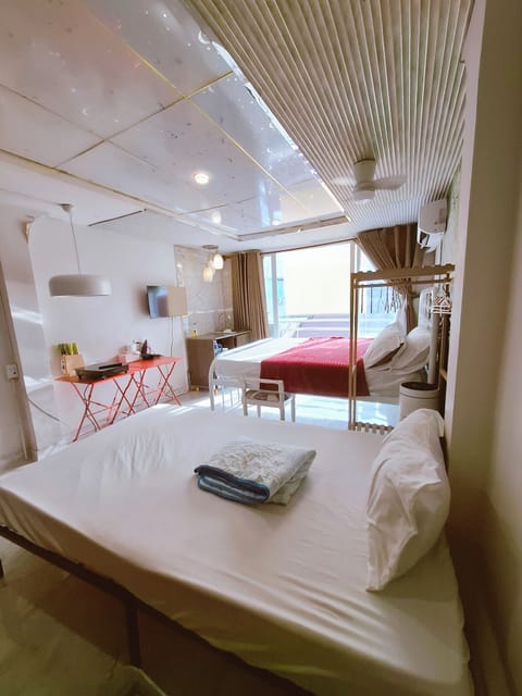 Family Triple Room | Premium bedding, minibar, desk, laptop workspace