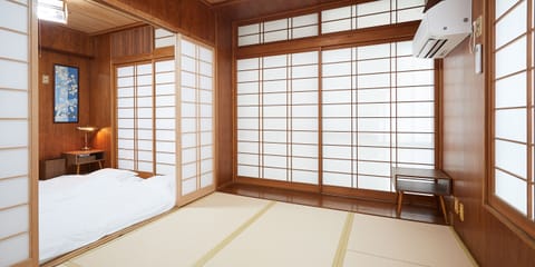 Family Room | Laptop workspace, blackout drapes, iron/ironing board, WiFi (free)