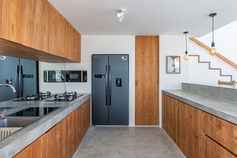 Superior Villa | Private kitchen | Fridge, stovetop, dishwasher, cookware/dishes/utensils