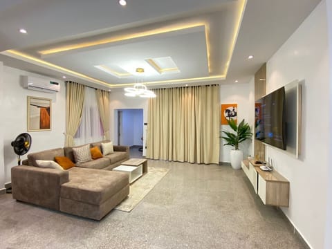 Luxury Apartment | Living area | 65-inch Smart TV with digital channels, TV, Netflix
