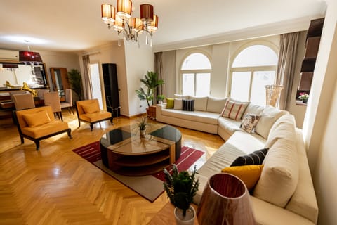 Comfort Apartment | Living room | 65-inch Smart TV with cable channels, TV