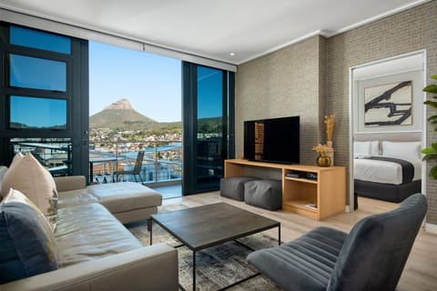 Exclusive Apartment | Living area | 45-inch flat-screen TV with cable channels, TV, streaming services