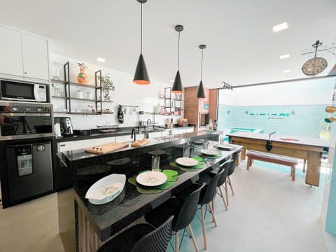 Deluxe Villa | Private kitchen | Full-size fridge, microwave, oven, stovetop