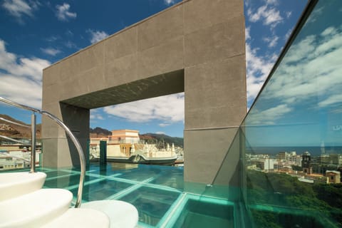 Outdoor pool, open 10:30 AM to 4:30 PM, pool umbrellas, sun loungers