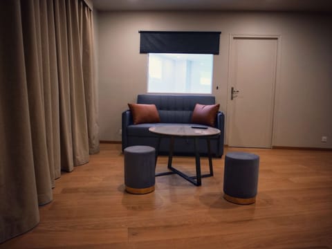 Suite, 2 Bedrooms | Desk, blackout drapes, soundproofing, iron/ironing board