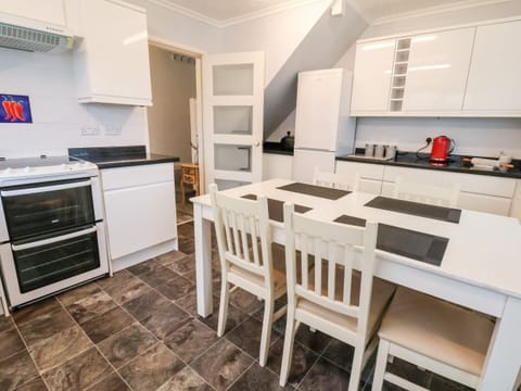 Fridge, electric kettle, toaster, cookware/dishes/utensils