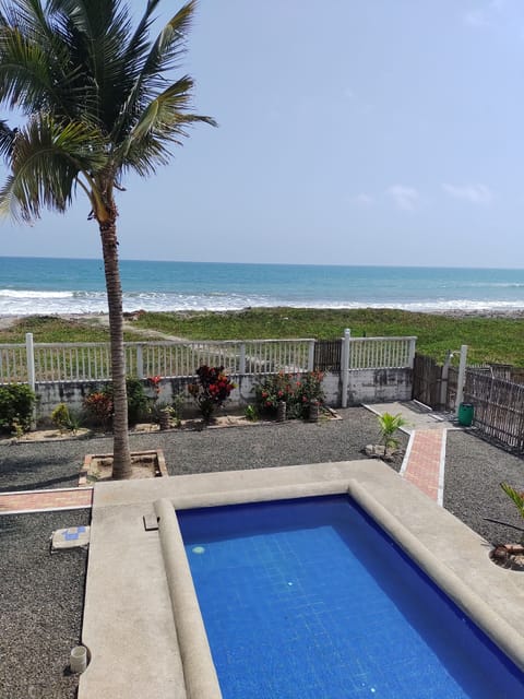 Outdoor pool, open 7:00 AM to 7:00 PM, sun loungers