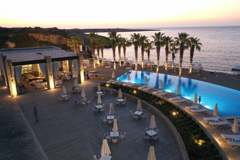 Indoor pool, seasonal outdoor pool, cabanas (surcharge), pool umbrellas