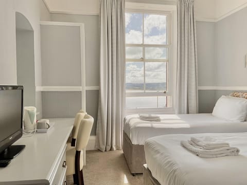 Standard Twin Room, 2 Twin Beds, Sea View | Desk, laptop workspace, free WiFi, bed sheets