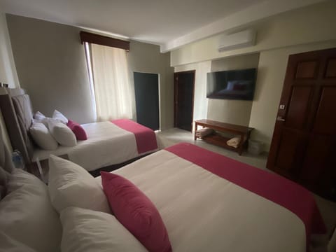 Deluxe Double Room, 2 Queen Beds | Blackout drapes, iron/ironing board, free WiFi, bed sheets