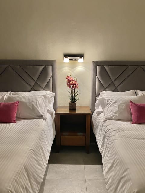 Deluxe Double Room | Blackout drapes, iron/ironing board, free WiFi, bed sheets