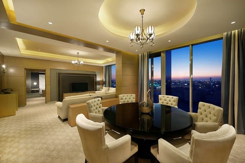 Deluxe Suite, 1 Bedroom | Living area | 42-inch LED TV with cable channels, TV