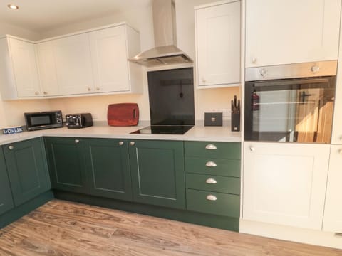 Fridge, electric kettle, toaster, cookware/dishes/utensils