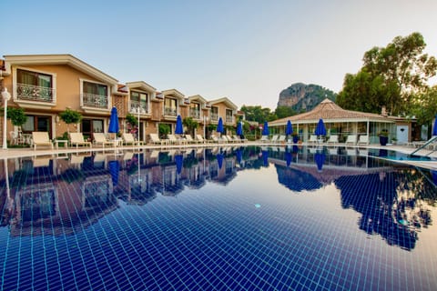 2 outdoor pools, open 8:00 AM to 7:30 PM, pool umbrellas, sun loungers