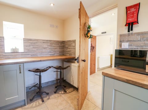 Fridge, electric kettle, toaster, cookware/dishes/utensils