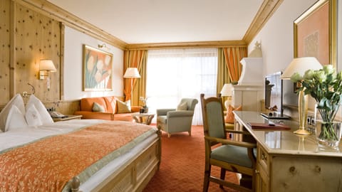 Junior Suite, Balcony | Living area | 42-inch LED TV with digital channels, TV
