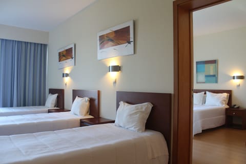 Family Room | Minibar, desk, laptop workspace, WiFi (free)