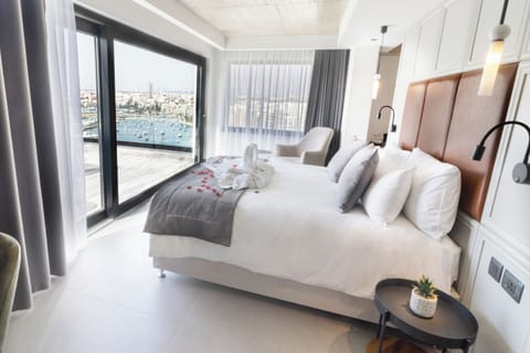Penthouse Suite, Hot Tub, Sea View | Minibar, in-room safe, desk, laptop workspace