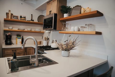Panoramic Apartment | Private kitchen | Microwave, coffee/tea maker, electric kettle, paper towels